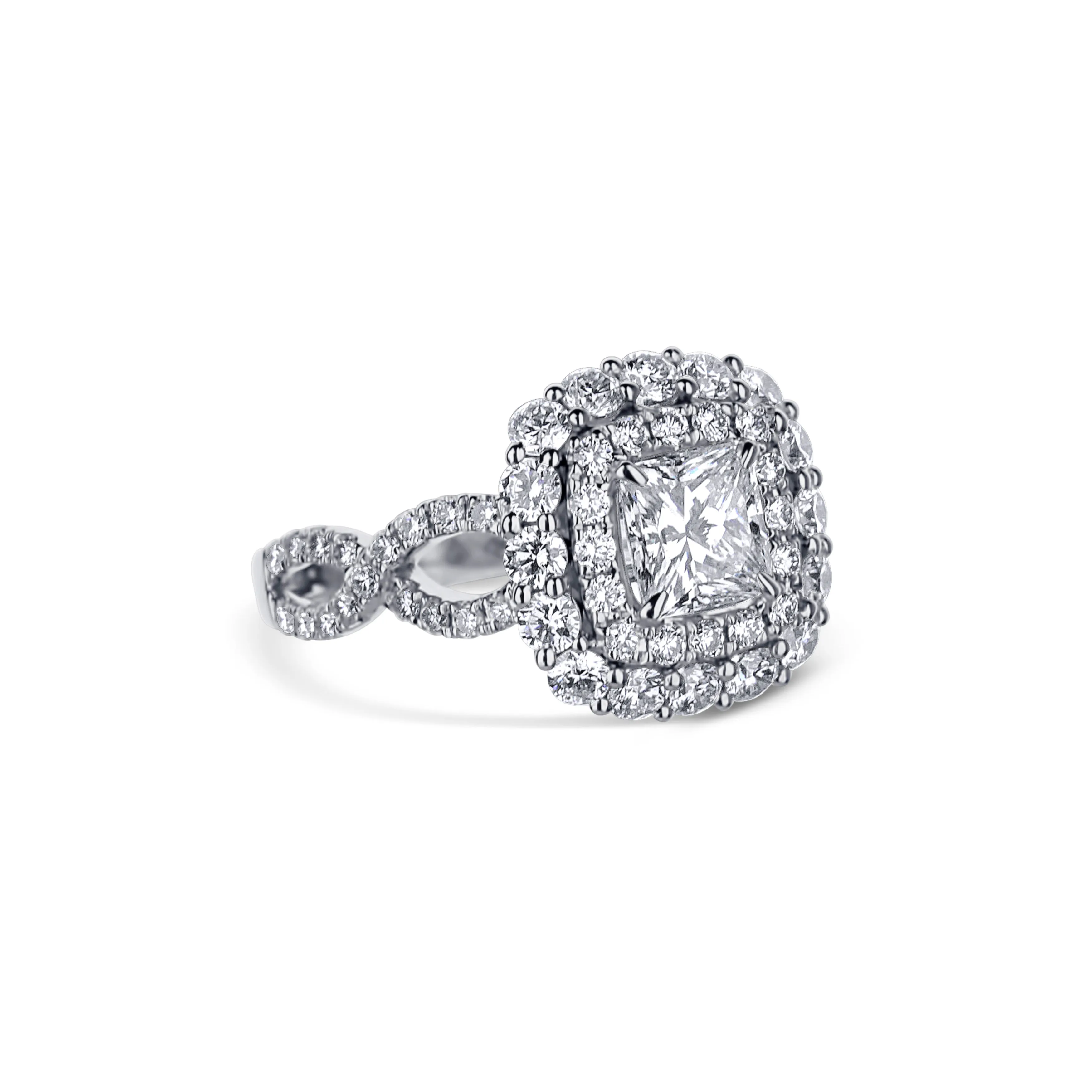 18K White Gold Radiant Cut Diamond Engagement Ring With Twisted Shank And Double Halo